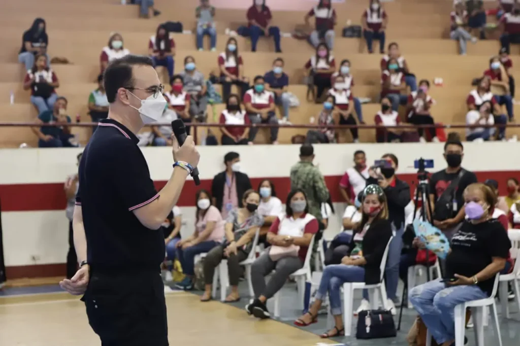 Cayetano addresses beneficiaries and local government officials in Lipa City, Batangas.