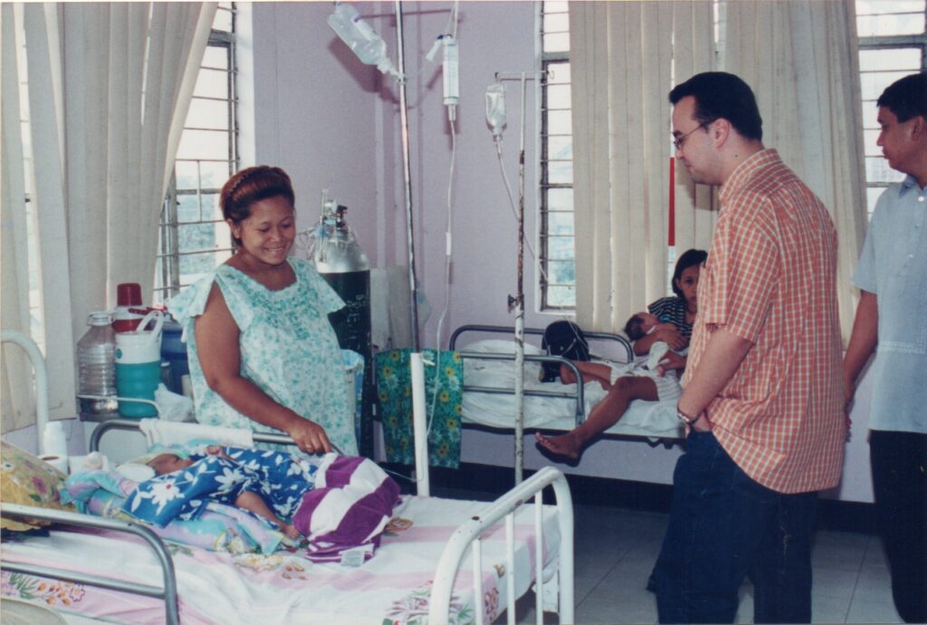 Alan Peter Cayetano visits a hospital ward, showing compassion, checking on patients, and supporting healthcare initiatives, reflecting care.