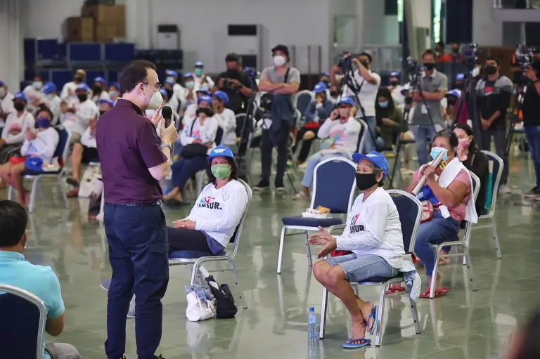 The sari-sari store owner beneficiaries receive P3,500 as financial aid during the event.