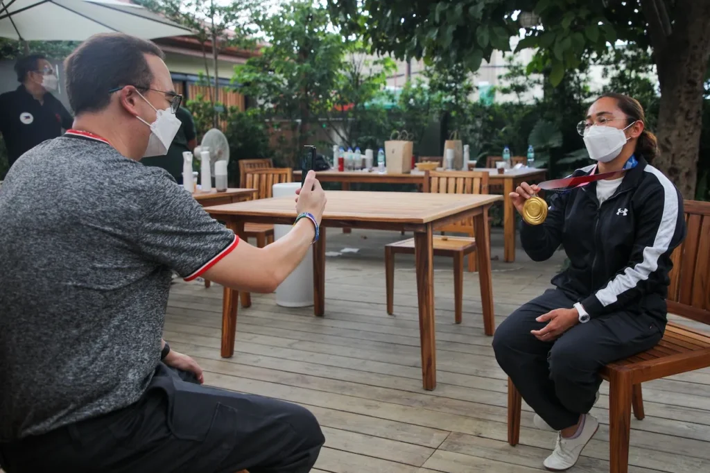 Former House Speaker Alan Peter Cayetano interviews Olympic gold medalist Hidilyn Diaz on August 27, 2021.